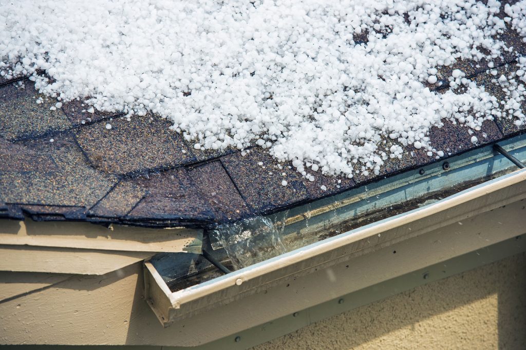 Determining the Extent of Hail Damage Necessary for Roof Replacement